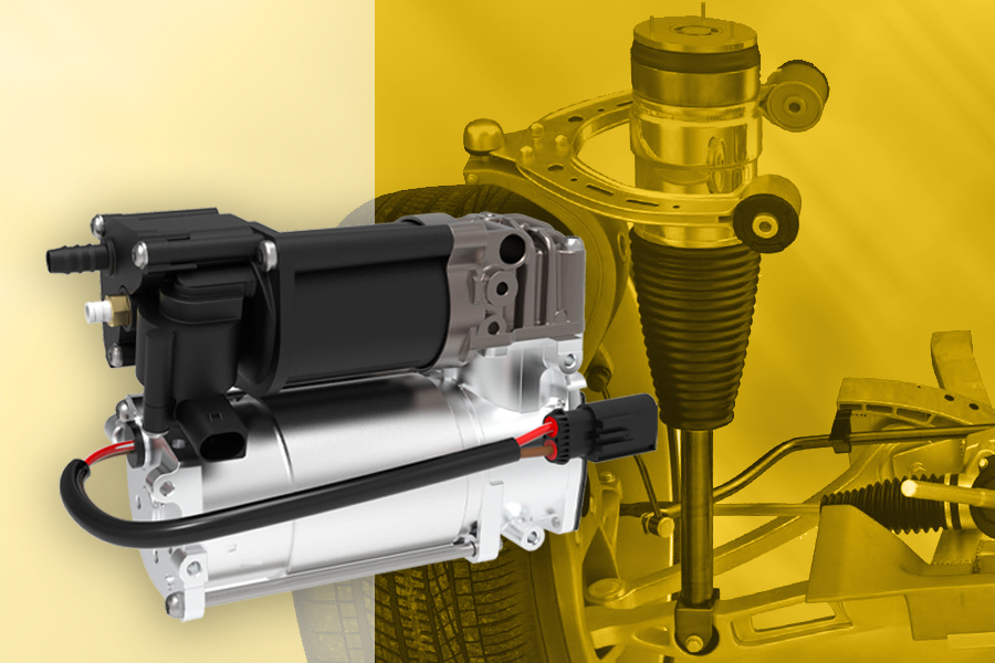 Magneti Marelli Parts & Services Luftfederungskompressor im Vordergrund, mit Rad, Achse und Luftfedersystem im Hintergrund zur Veranschaulichung der Komponentenanwendung.